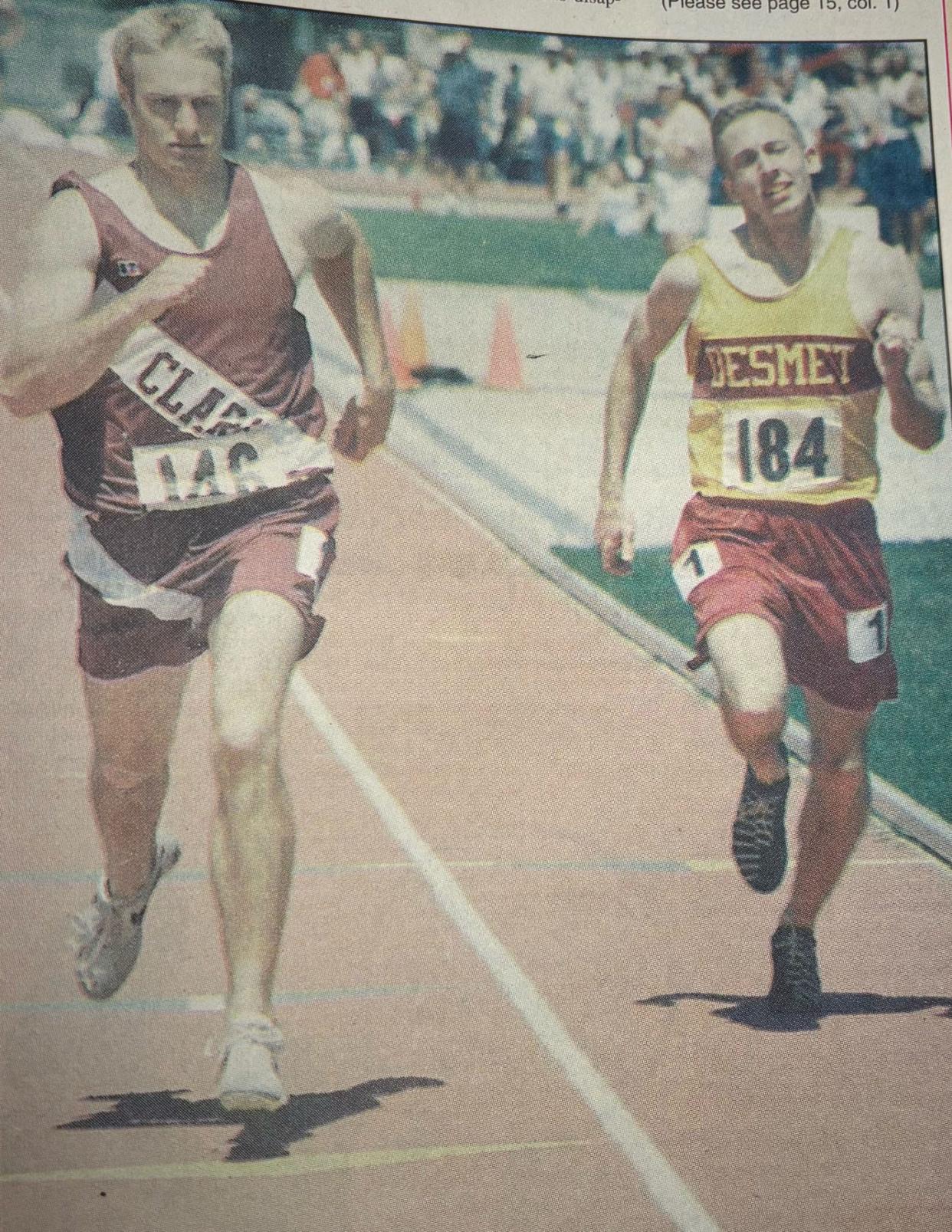 Dan Olson of Clark holds off George Mollner of De Smet in the Class B boys' 400-meter dash during the 1999 state high school track and field meet at Sioux Falls.