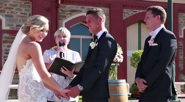 The boy's interruption sent the bride into bashful laugh. Source: YouTube/hannahgrace