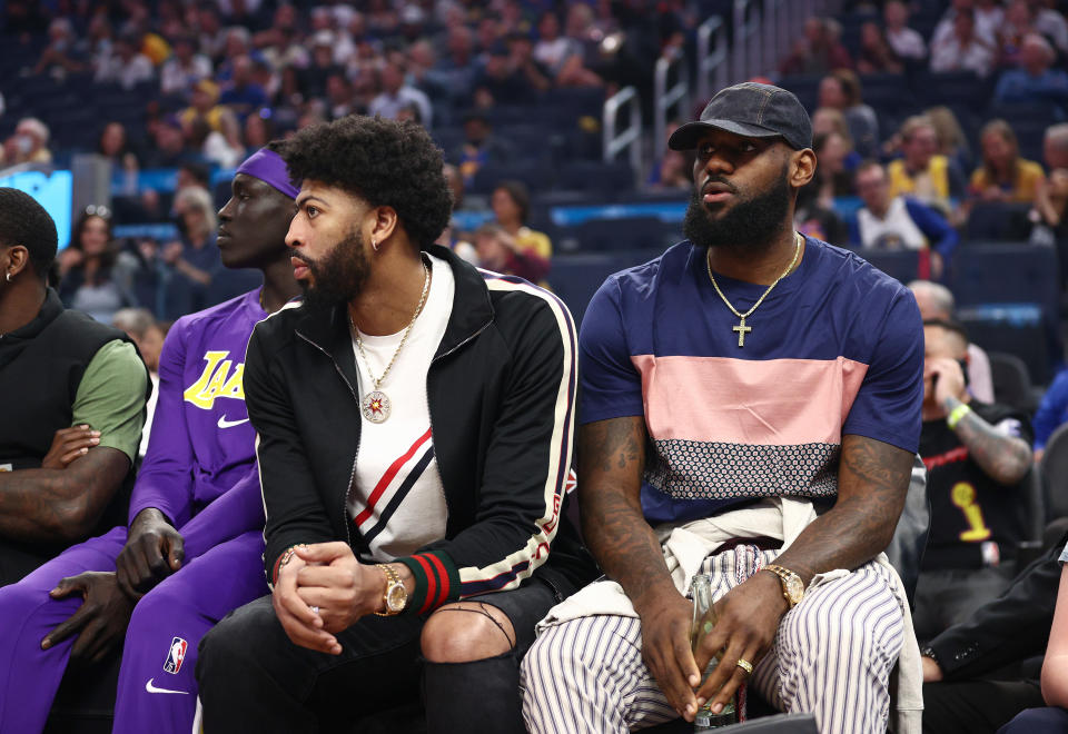 SAN FRANCISCO, CALIFORNIA - APRIL 07:  Injured Anthony Davis #3 (left) and LeBron James #6 of the Los Angeles Lakers sits on the bench during their game Golden State Warriors in the first half at Chase Center on April 07, 2022 in San Francisco, California. NOTE TO USER: User expressly acknowledges and agrees that, by downloading and/or using this photograph, User is consenting to the terms and conditions of the Getty Images License Agreement.  (Photo by Ezra Shaw/Getty Images)