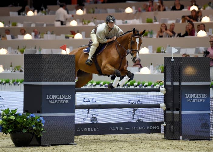 Kaley jumping a horse during competition