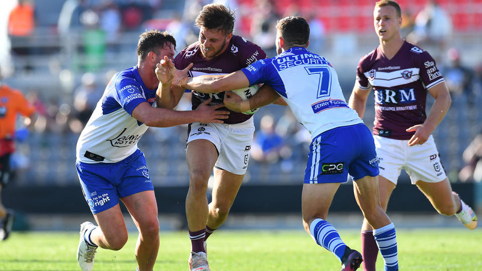 Manly and the Bulldogs, pictured here in action during round 24 of the NRL.