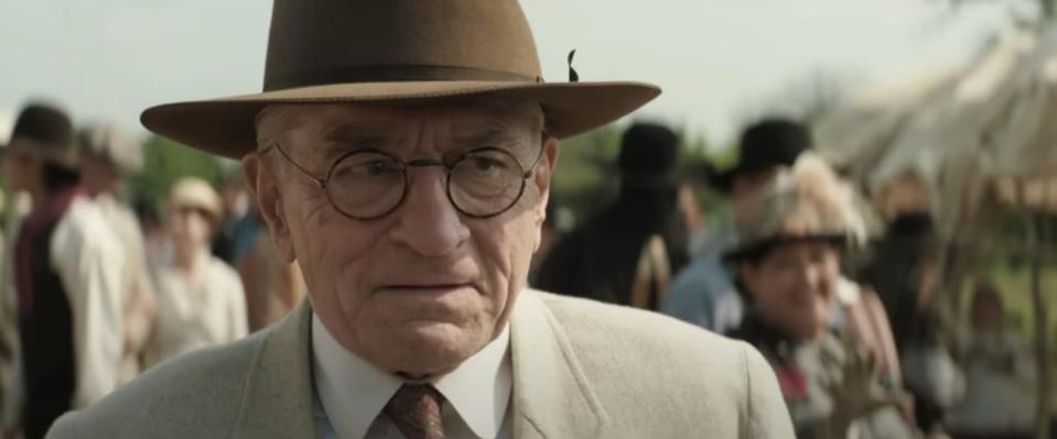 Robert De Niro in a suit and hat