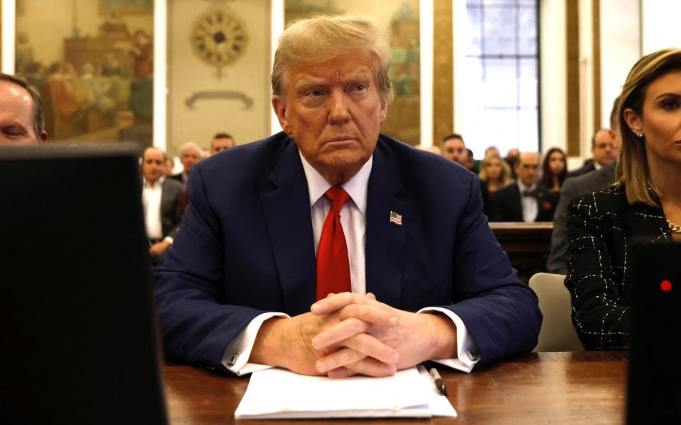 Donald Trump sits in New York State Supreme Court during the civil fraud trial against the Trump Organization in January 2024.