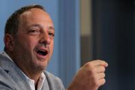 FILE PHOTO: Andrew Left, the founder of Citron Research, speaks during the Reuters Global Investment 2019 Outlook Summit, in New York