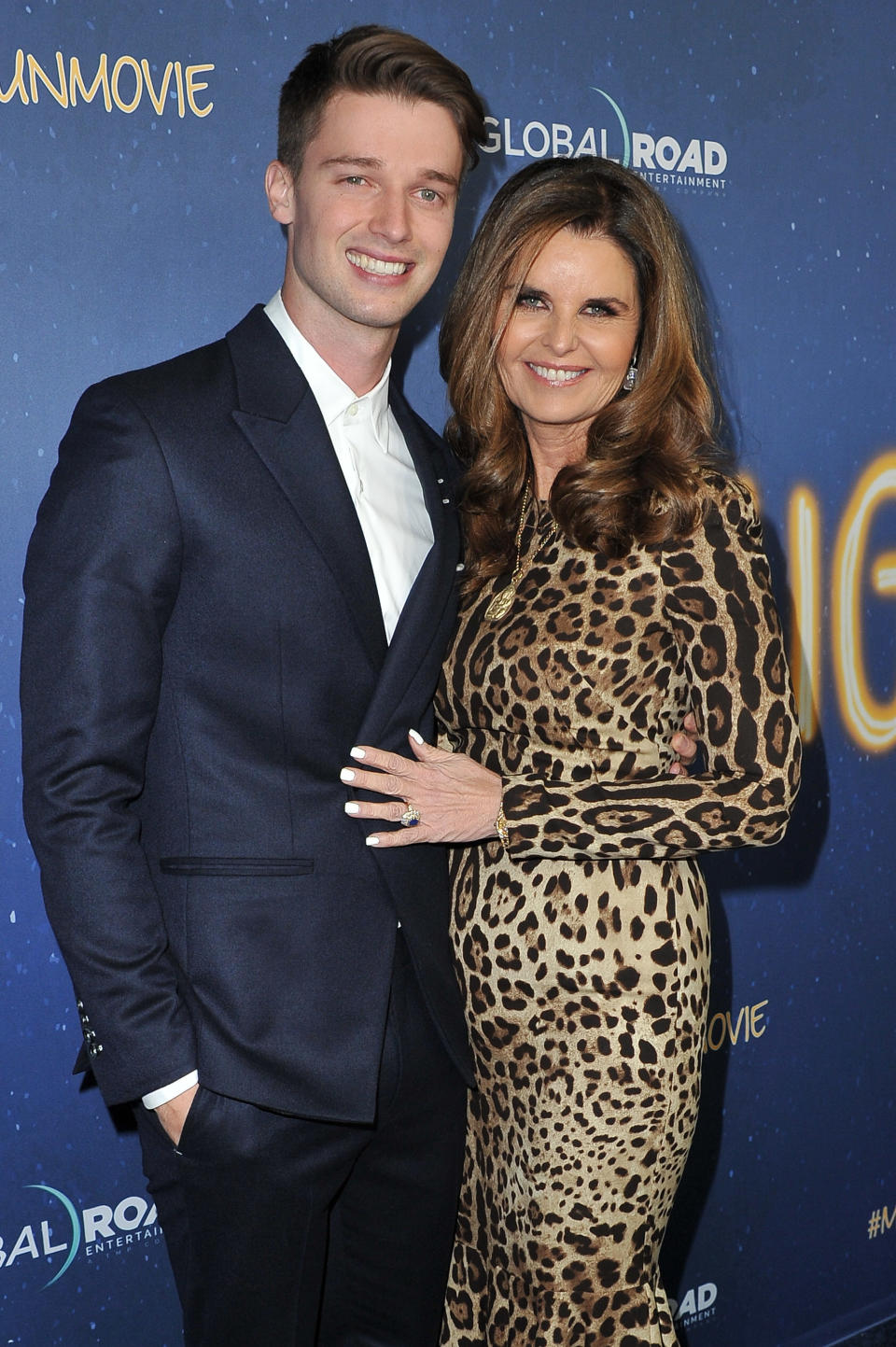 Maria Shriver and Patrick Schwarzenegger pose at the 2018 "Midnight Sun" premiere