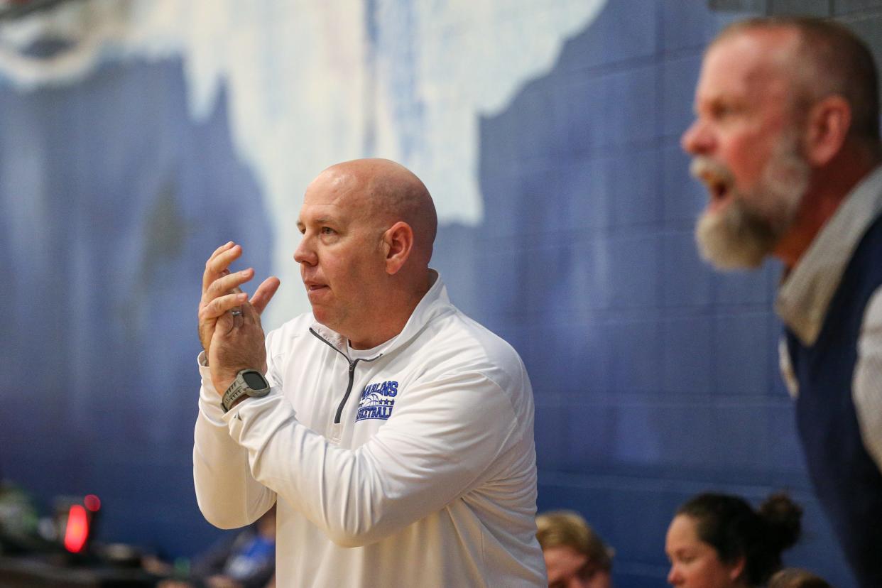 Port Aransas head basketball coach Kris Jones claps for a penalty call during the game at Port Aransas High School on Tuesday, Nov. 29, 2022.