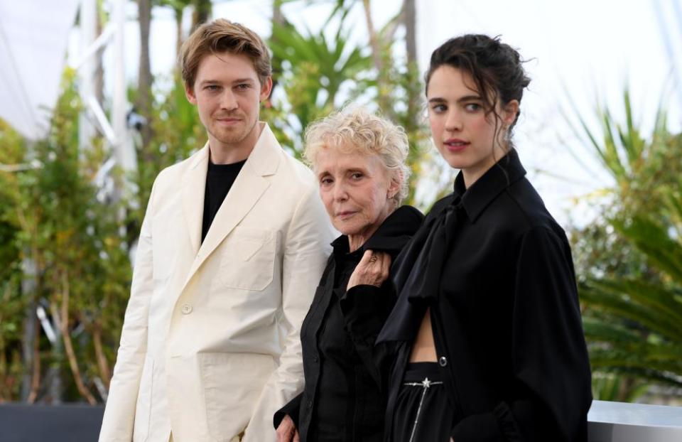 Director Claire Denis, centre, with Stars at Noon actors Joe Alwyn and Margaret Qualley.