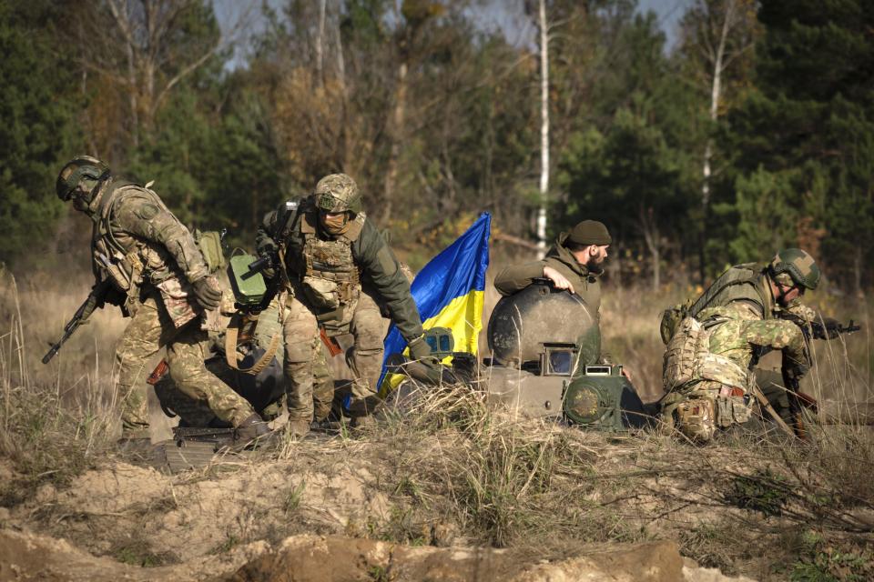 FILE - Soldiers of Ukraine's National Guard 1st Brigade hold combat training in northern Ukraine on Friday, Nov. 3, 2023. As the Kremlin watches for more signs of crumbling Western support for Ukraine, the Russian military has pressed attacks in several sectors in a bid to drain Kyiv's reserves and deplete its munitions. (AP Photo/Efrem Lukatsky, File)