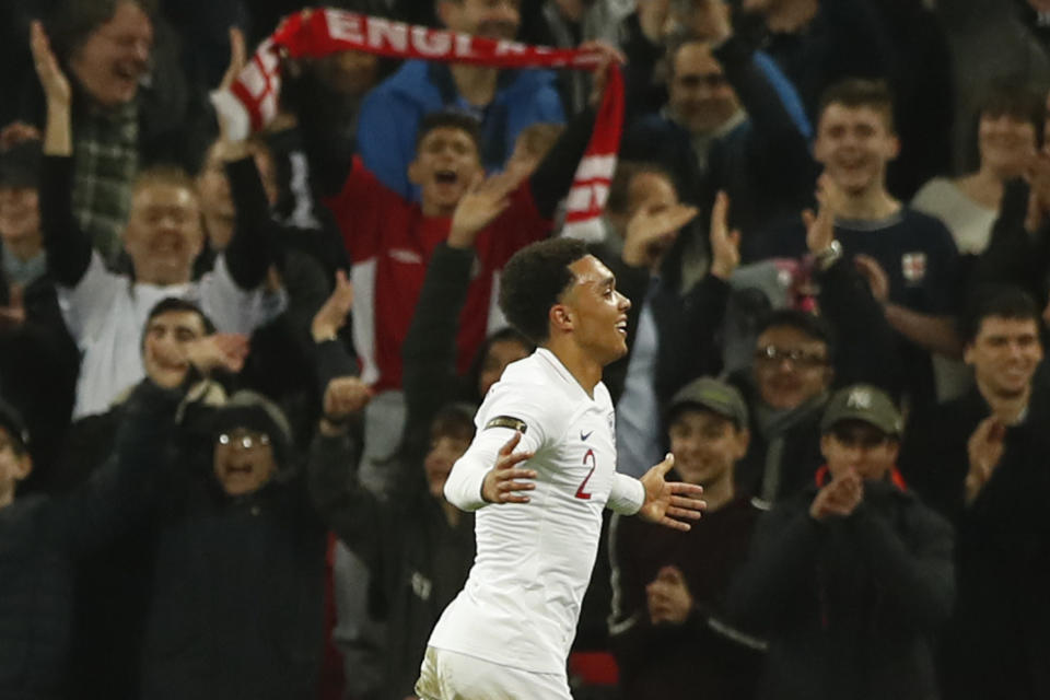 England's Trent Alexander-Arnold celebrates scoring his side's second goal during the international friendly soccer match between England and the United States at Wembley stadium, Thursday, Nov. 15, 2018. (AP Photo/Alastair Grant)