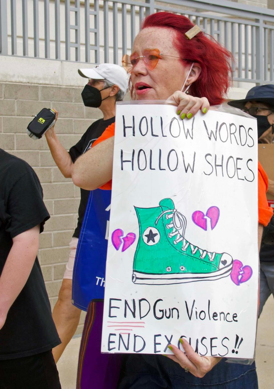 Kat Hampson participates in the March For Our Lives rally in downtown Gainesville on Saturday. “I am a former teacher, and a mom… I’m marching for my children, and I’m marching for the children who can’t march anymore. After we march, we legislate,” said Hampson.