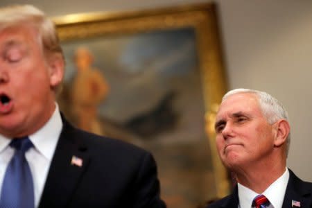 U.S. President Donald Trump and Vice President Mike Pence participate in a signing ceremony for Space Policy Directive at the White House in Washington D.C., U.S. December 11, 2017. REUTERS/Carlos Barria