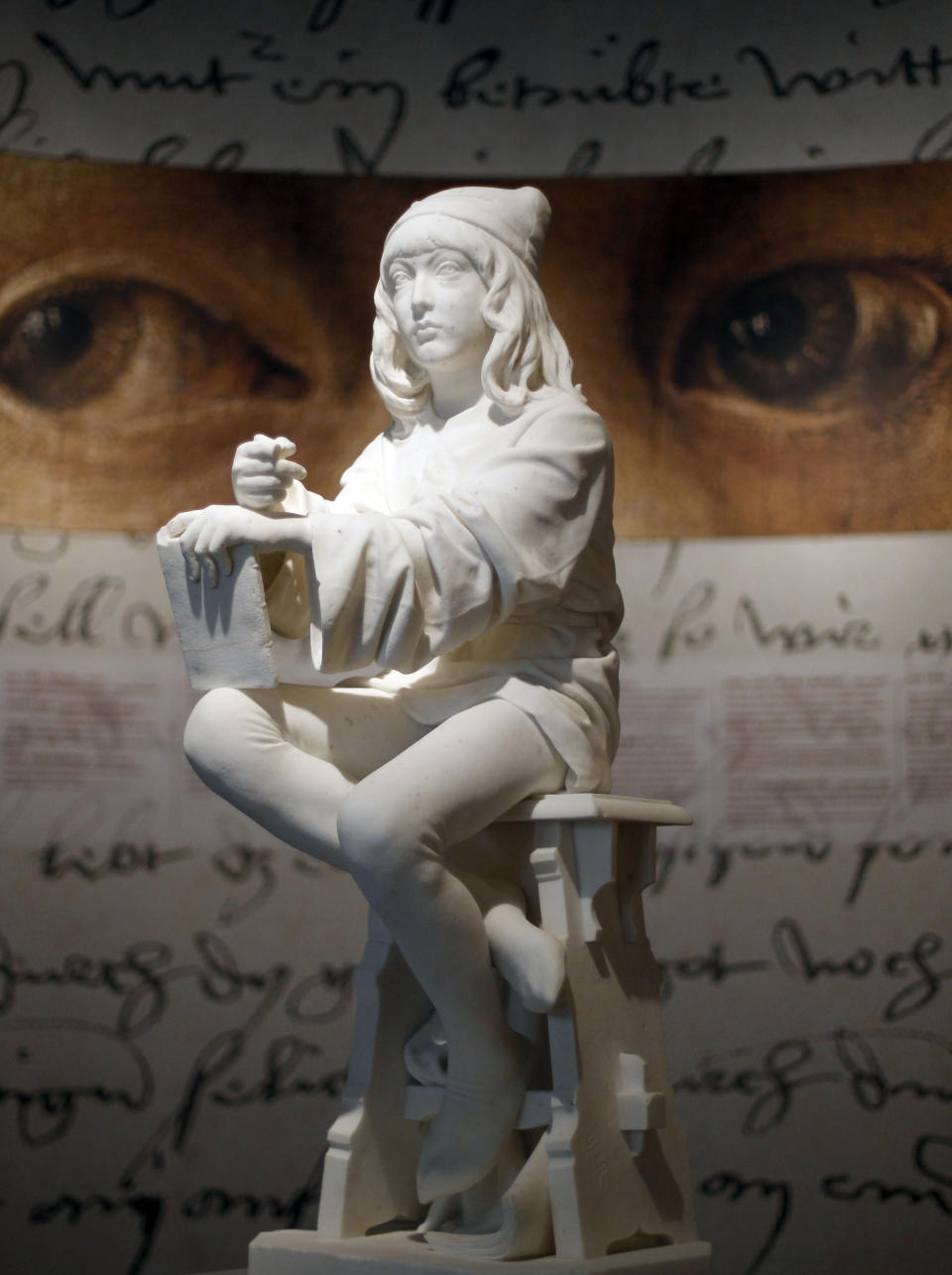 TO GO WITH STORY SLUGGED ' GERMANY DUERER EXHIBIT' - FILE - In this May 22, 2012 file picture a sculpture of young Albrecht Duerer stands at the exhibition entrance in the Germanisches Museum in Nuremberg, Germany. The sculpture is based on the self-portrait the young Duerer drew of himself. The sculptor portrayed the 'child prodigy' around 1880, when Duerer became the primary hero of German art. The statue was believed to have been destroyed in WWII. It was re-discovered in the gardens of the American Academy in Berlin. Germany's biggest exhibit of works by the German artist Albrecht Duerer will open to the public from May 24 until Sept. 2, 2012. (AP Photo/Matthias Schrader)