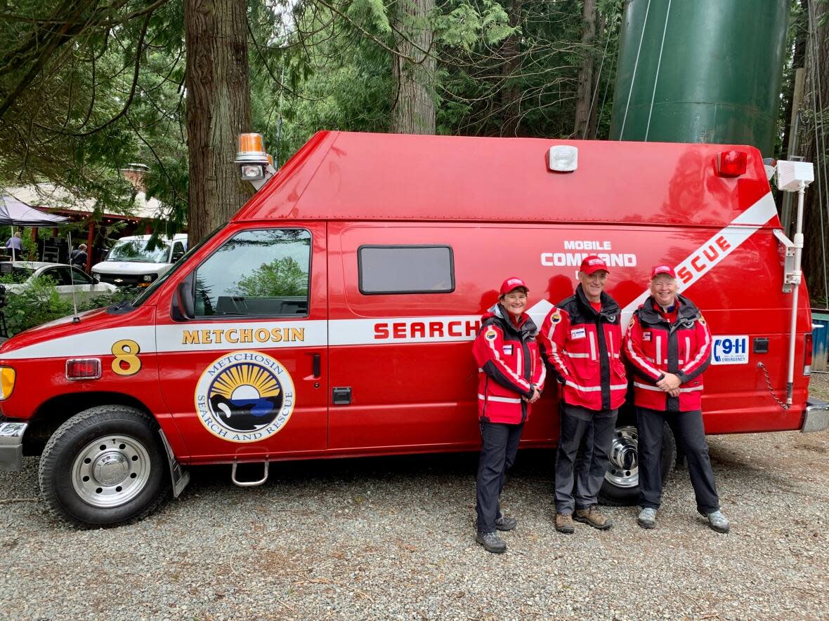 Linda Hildebrandt, Dennis McMillan and Marie Burgess with Metchosin Search and Rescue say the new cell towers are great news.  (Kathryn Marlow/CBC - image credit)