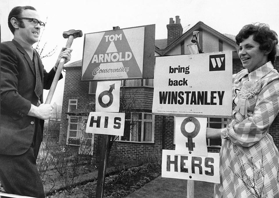 Political signs affixed to poles are popular in the U.K. <a href="https://www.gettyimages.com/detail/news-photo/togetherness-ends-at-the-ballot-box-for-ann-and-derek-news-photo/90769697?phrase=political%20lawn%20signs&adppopup=true" rel="nofollow noopener" target="_blank" data-ylk="slk:Manchester Daily Express/SSPL via Getty Images;elm:context_link;itc:0;sec:content-canvas" class="link ">Manchester Daily Express/SSPL via Getty Images</a>