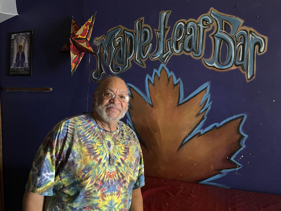 Bass player George Porter Jr., a longtime fixture on the New Orleans music scene and a founding member of the influential funk band the Meters, poses at the Maple Leaf Bar in New Orleans, Thursday, April 20, 2023. Porter has been a regular performer at the New Orleans Jazz & Heritage Festival since it began in 1970, and is playing the festival again this year with his band, Runnin' Pardners. (AP Photo/Kevin McGill)