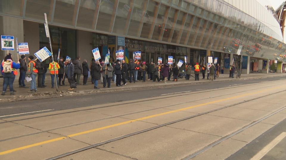 Hundreds of workers gathered outside the Art Gallery of Ontario Tuesday to begin strike action.