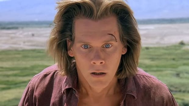 Kevin Bacon as Valentine McKee in "Tremors" (1990)<p>Universal Pictures</p>