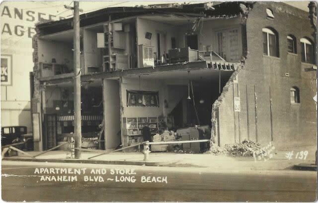 A collapsed facade of a building. Text: Apartment and store. Anaheim Blvd., Long Beach