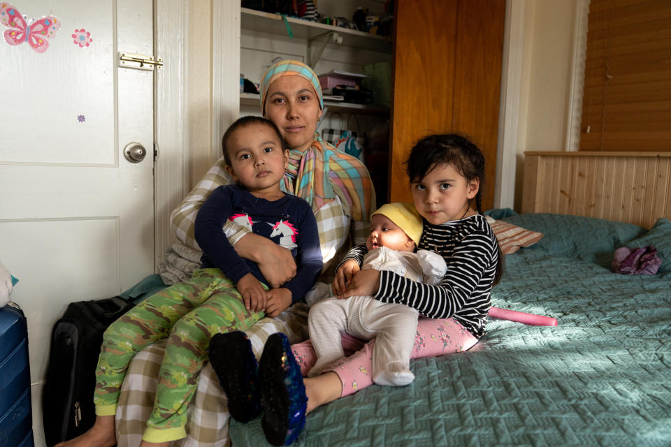 Muhammad's wife, Aida, poses for a portrait with their children on Feb. 4, 2021. (Photo: Ilana Panich-Linsman for HuffPost)