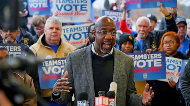 PHOTO: Reverend Raphael Warnock, Democratic Senator for Georgia, speaks during a 'Get Out the Vote' midterm runoff election rally and Teamsters worksite visit at a UPS facility in Atlanta, Ga., Dec. 5, 2022.  (Cheney Orr/Reuters)