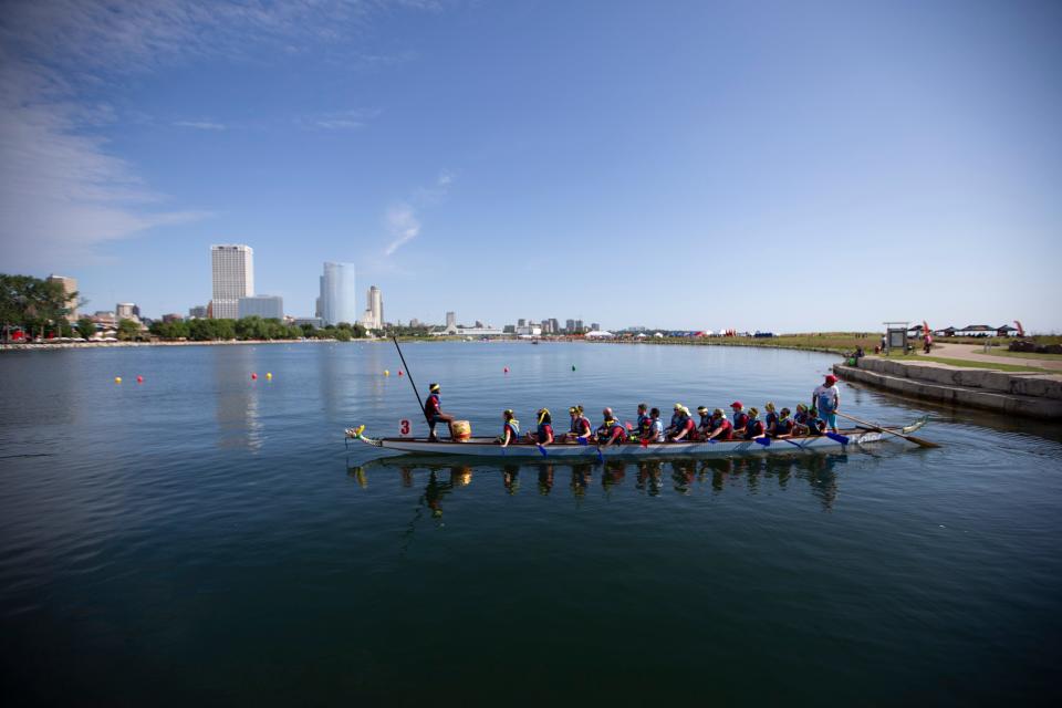 Competitors get ready to race at the seventh annual Milwaukee Dragon Boat Festival held at Lakeshore State Park in Milwaukee, Aug. 10, 2019.