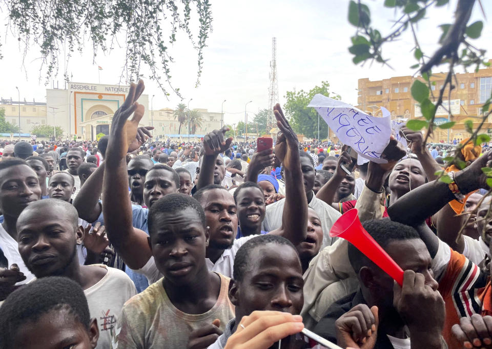 Supporters of mutinous soldiers demonstrate in Niamey, Niger, Thursday July 27 2023. Governing bodies in Africa condemned what they characterized as a coup attempt Wednesday against Niger's President Mohamed Bazoum, after members of the presidential guard declared they had seized power in a coup over the West African country's deteriorating security situation. (AP Photo/Sam Mednick)