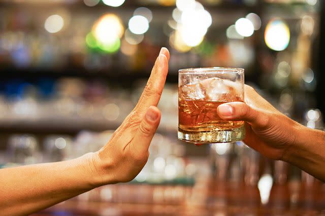 <p>Getty</p> Saying "no" to alcohol.