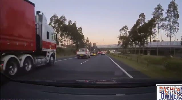 The truck avoided slamming into the ute by only inches. Source: Dashcam Owners Australia