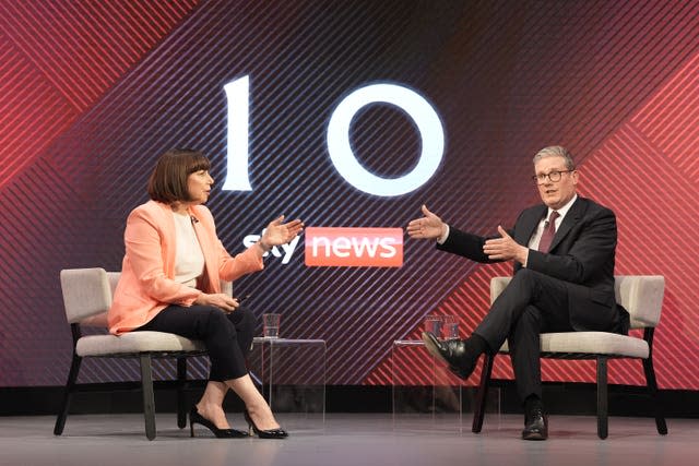 Sir Keir Starmer being interviewed by Beth Rigby on stage