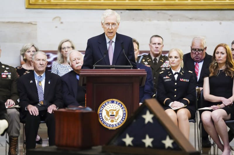 Senate Minority Leader Mitch McConnell (C) speaks during a ceremony honoring retired Army Col. Ralph Puckett Jr. , the last surviving Medal of Honor recipient for acts performed during the Korean War, in the Rotunda at the U.S. Capitol in Washington D.C. on Monday. Pool Photo by Shawn Thew/UPI