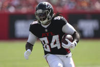 Atlanta Falcons running back Cordarrelle Patterson (84) runs against the Tampa Bay Buccaneers during the first half of an NFL football game, Sunday, Oct. 22, 2023, in Tampa, Fla. (AP Photo/Mark LoMoglio)