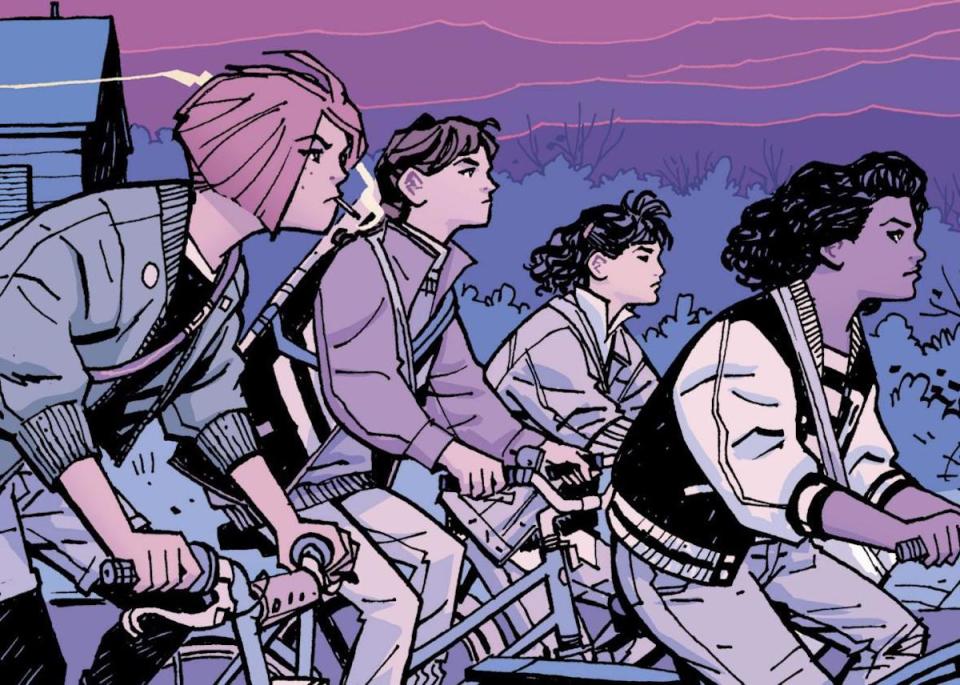 Four teen girls ride bikes in Paper Girls.