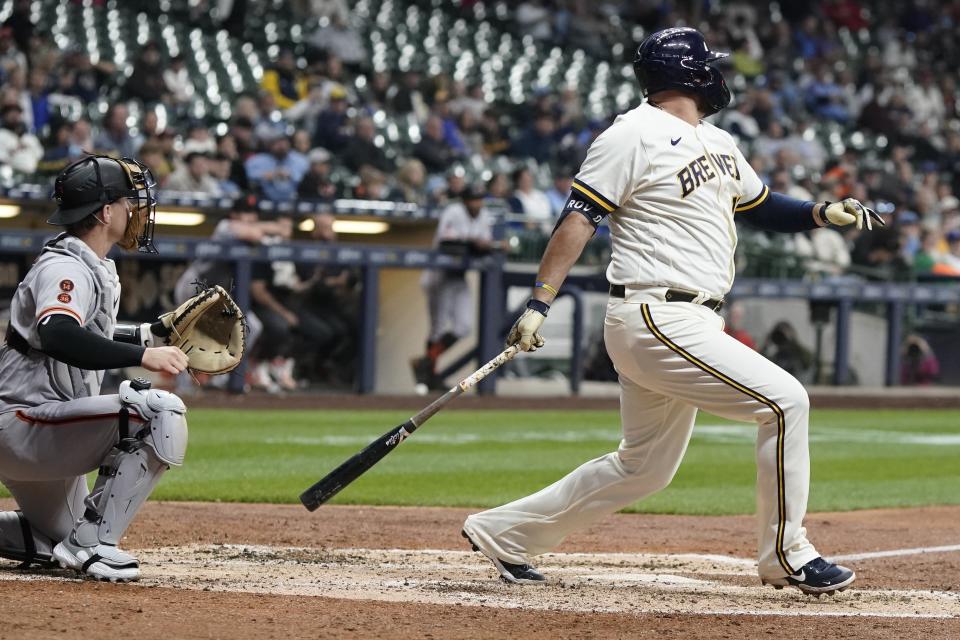 Milwaukee Brewers' Rowdy Tellez hits a single during the fifth inning of a baseball game against the San Francisco Giants Thursday, May 25, 2023, in Milwaukee. (AP Photo/Morry Gash)
