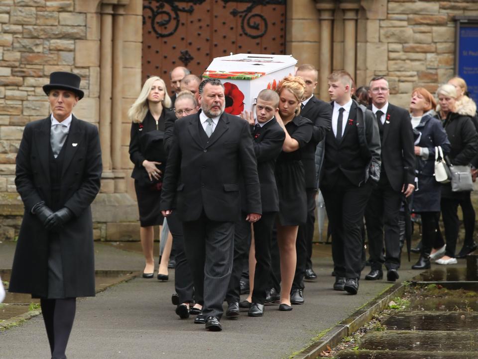 The coffin of Michelle Pearson is carried out of St Paul’s Church in Walkden, Salford, after her funeralDanny Lawson/PA