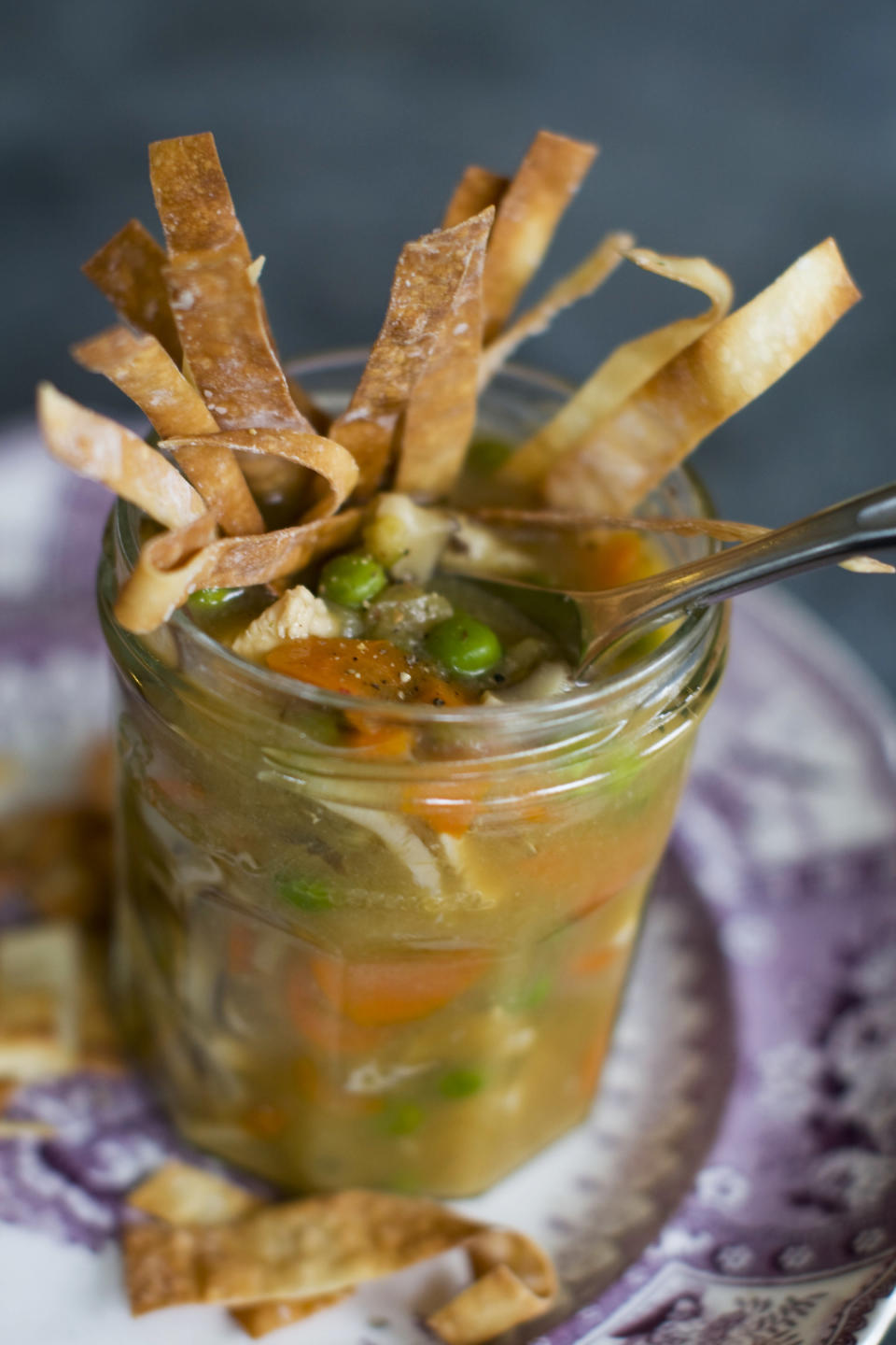 This Dec. 2, 2013 photo shows Chinese chicken and vegetable soup in Concord, N.H. This recipe's fragrant broth is essentially a Chinese version of a Jewish chicken soup. (AP Photo/Matthew Mead)