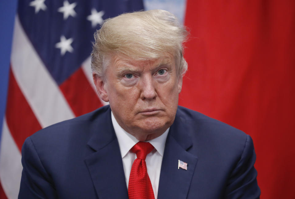 President Trump listens to Japan’s Prime Minister Shinzo Abe speak during a meeting on Nov. 30. (Photo: Pablo Martinez Monsivais/AP)