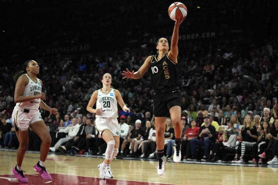Las Vegas Aces guard Kelsey Plum (10) shoots against the New York Liberty during the second half in Game 1 of a WNBA basketball final playoff series Sunday, Oct. 8, 2023, in Las Vegas. (AP Photo/John Locher)