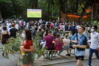 People watch the UEFA EURO 2020 Turkey vs Italy opening match, in Berlin