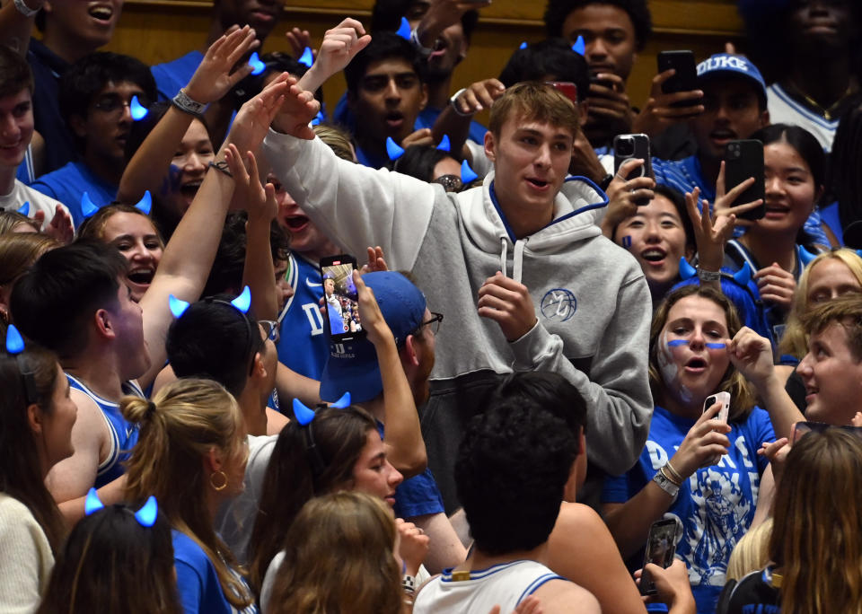 Cooper Flagg is greeted by fans during 