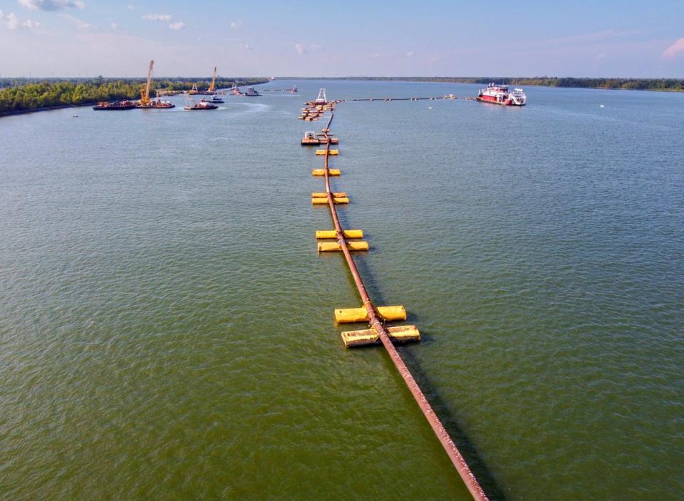 The Army Corps of Engineers is finishing a 25-foot underwater levee in the Mississippi in an attempt to prevent saltwater from contaminating drinking supplies (AP)