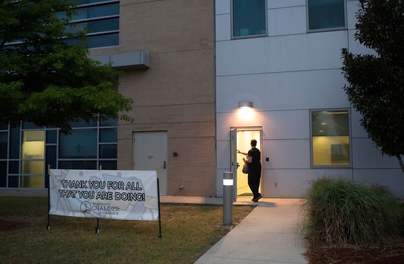 Emergency medicine physician Krajewski arrives at work for start of his shift in New Orleans