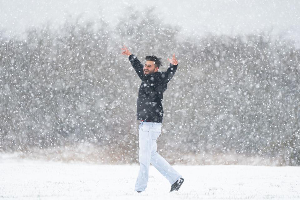A man enjoying the snow on the Dunstable Downs in Bedfordshire. (Joe Giddens/PA Wire)