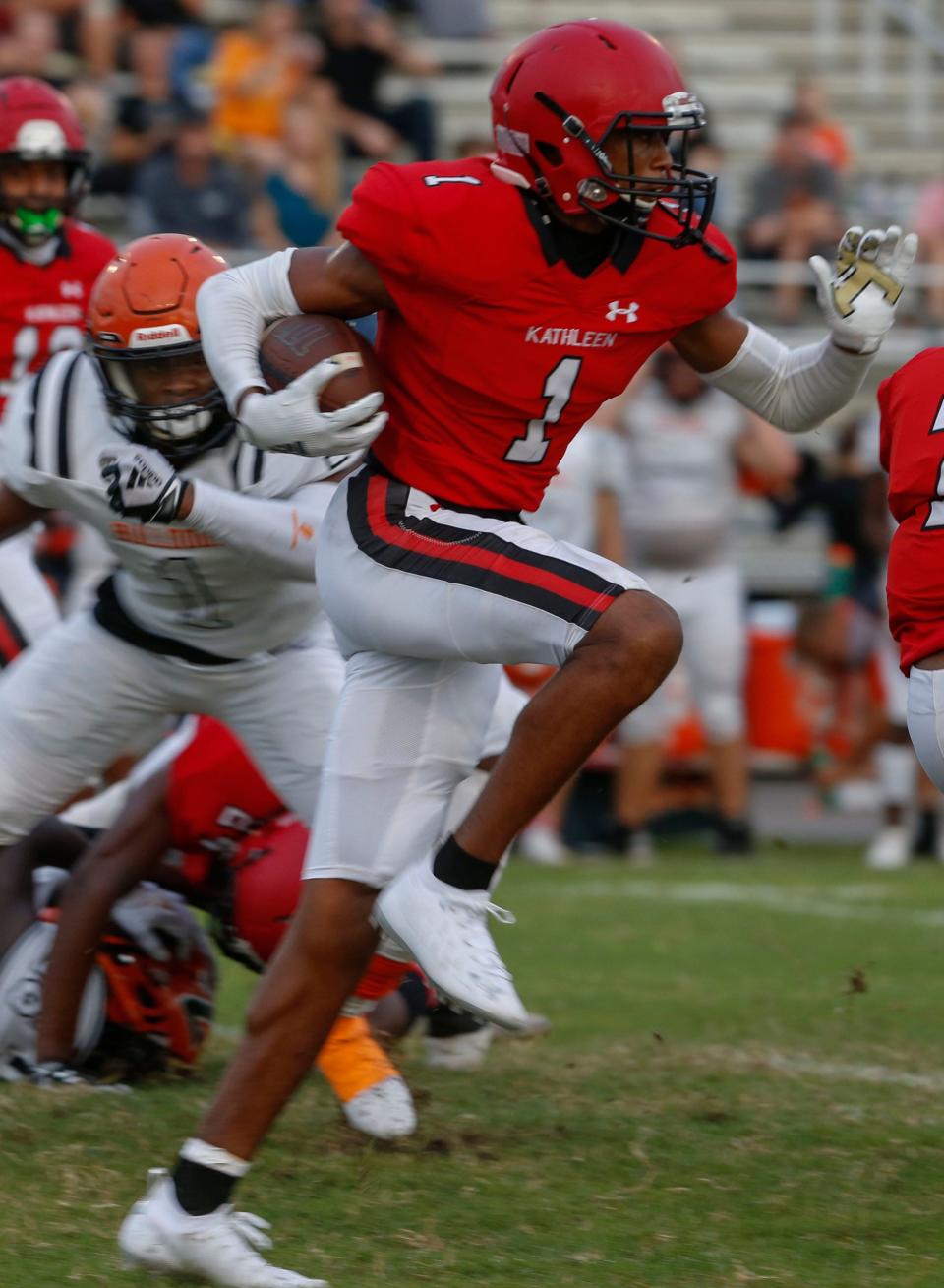 Kathleen's #1 Shadarian Harrison cuts up hill against  Zephyrhills secondary for a first down in the first quarter. Kathleen High School Vs Zephyrhills High School at Kathleen Hight Lakeland Fl, August 27th 2021. Special to the Ledger/ Calvin Knight