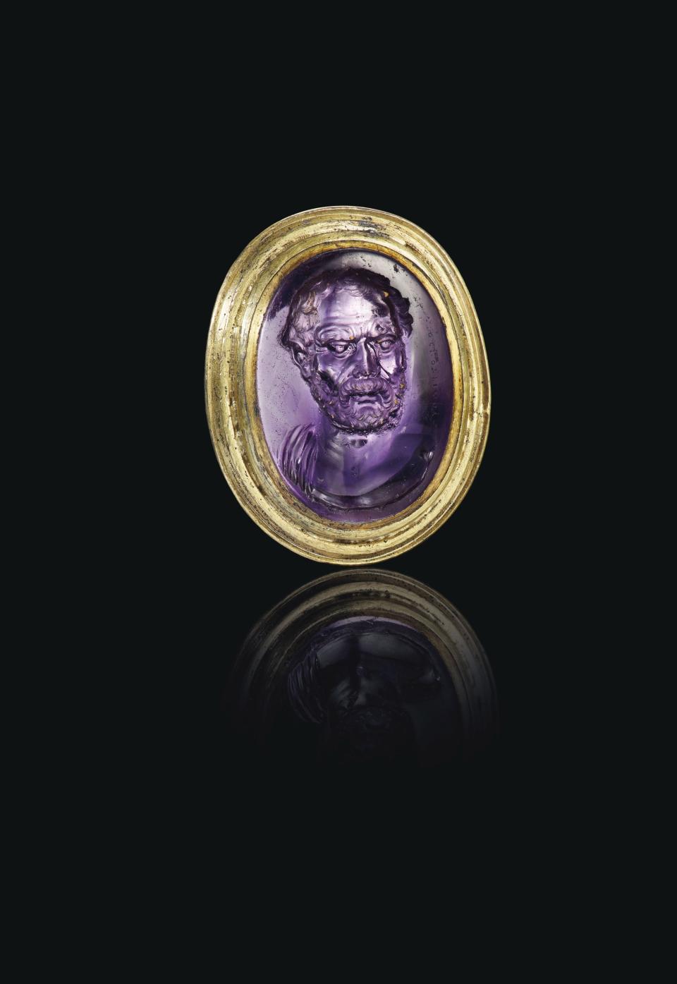 The Roman amethyst ring stone with a portrait of Demosthenes signed by Dioskourides.