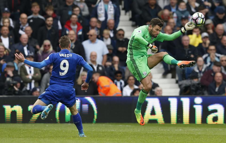 <p>Leicester City’s Jamie Vardy in action with West Bromwich Albion’s Ben Foster </p>