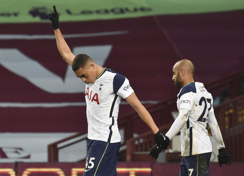 Tottenham's Carlos Vinicius reacts after scoring his team's first goal during the English Premier League soccer match between Aston Villa and Tottenham Hotspur at Villa Park in Birmingham, England, Sunday, March 21, 2021. (AP Photo/Rui Vieira,Pool)