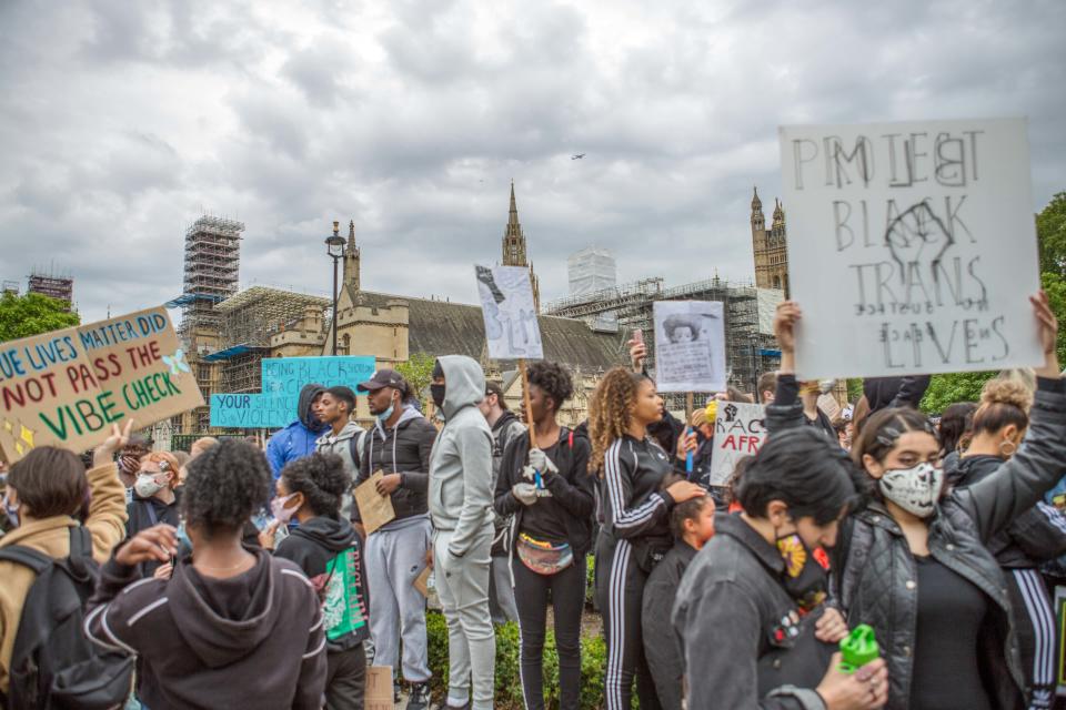  Protesters holding BLM placards during the demonstration. Protesters from the Black Lives Matter campaign demand justice for George Floyd and an end to Police violence in London, United Kingdom. The death of an African-American man, George Floyd, at the hands of police in Minneapolis has sparked violent protests across the USA. A video of the incident, taken by a bystander and posted on social media, showed Floyd's neck being pinned to the ground by police officer, Derek Chauvin, as he repeatedly said "I can? breathe". Chauvin was fired along with three other officers and has been charged with third-degree murder and manslaughter. (Photo by Rahman Hassani / SOPA Images/Sipa USA) 