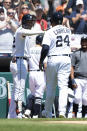 Detroit Tigers designated hitter Miguel Cabrera (24) is greeted by teammate Victor Reyes after hitting a solo home run in the second inning of a baseball game in Detroit, Sunday, May 15, 2022. (AP Photo/Lon Horwedel)