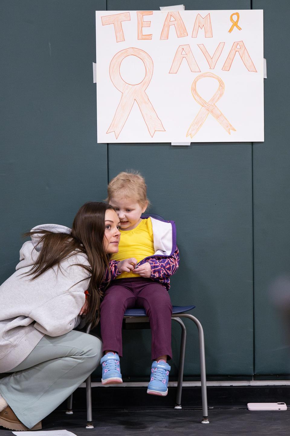 Ava Blazis, a 5-year-old Sutton native with acute lymphoblastic leukemia, talks to Lily Sullivan. Sullivan, now cancer free, had the same diagnosis as Ava.