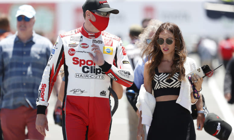 Kyle Busch and his wife Samantha at a NASCAR race